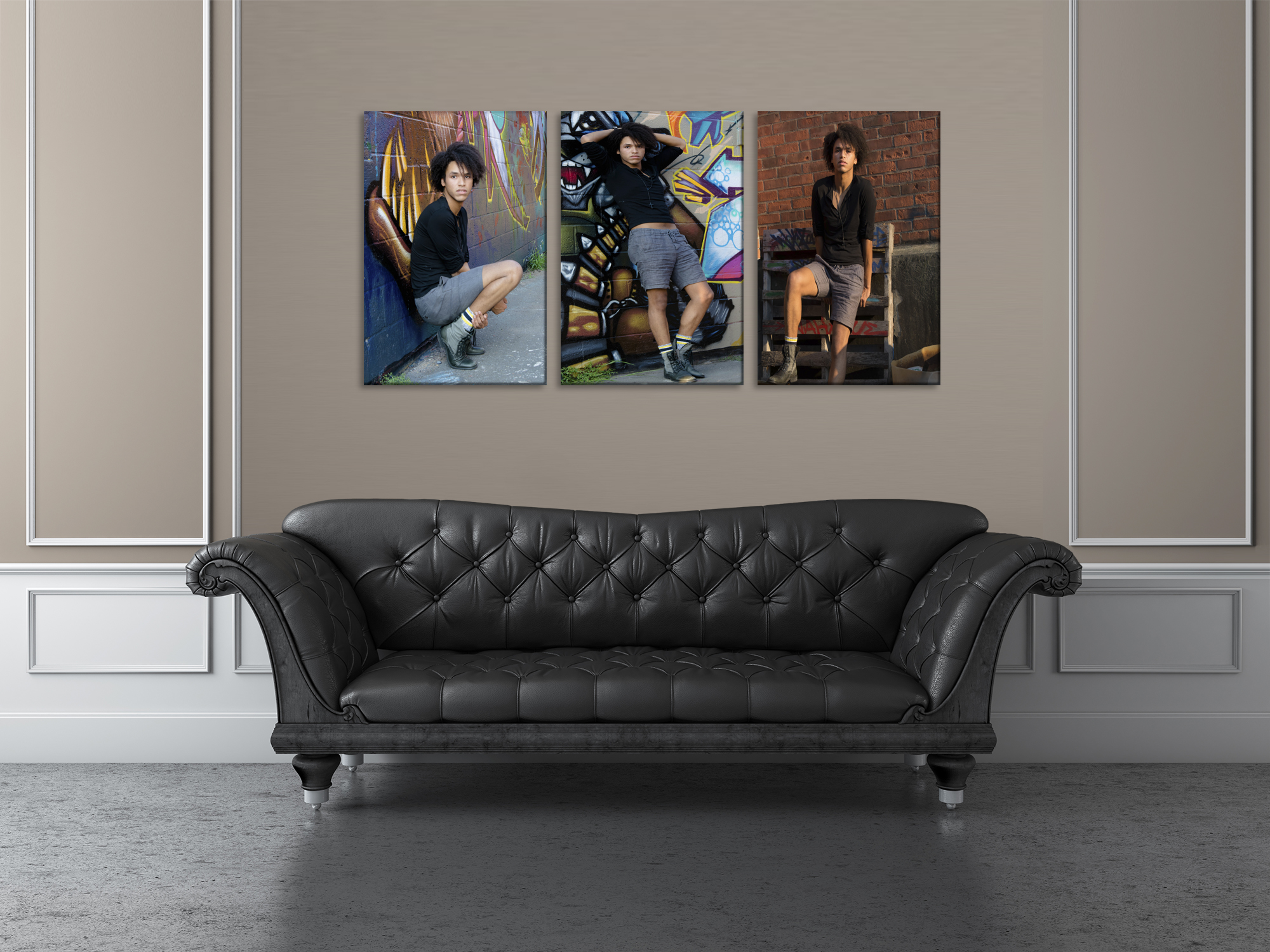 3 16x24 photos mounted on a wall above a black leather sofa